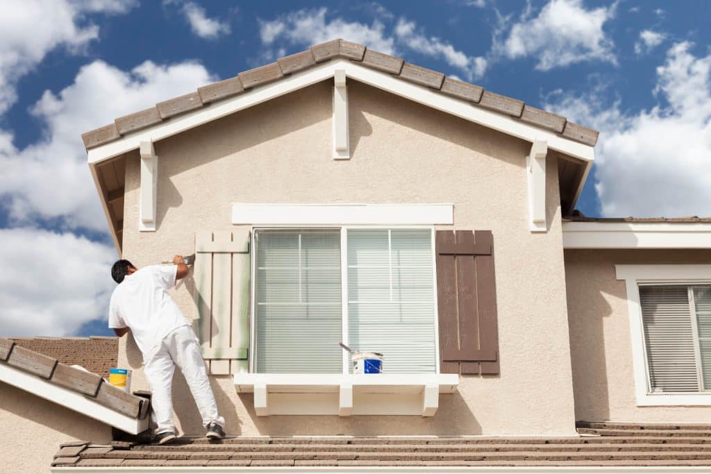 painting contractor painting house exterior