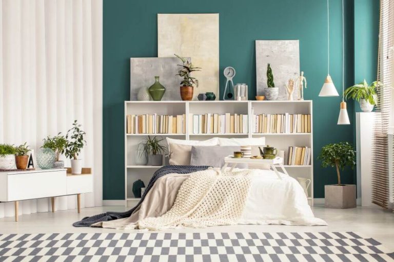 Bedroom with bookshelves and green wall - TurnKey Painter